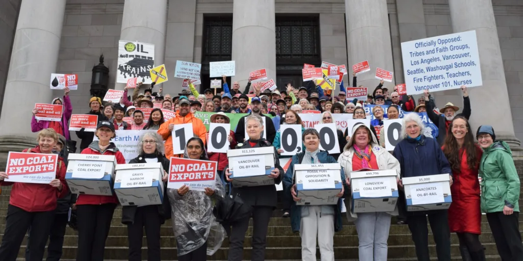 Activists deliver petitions against fossil-fuel terminals to the Washington State Capitol in Olympia, 2017.