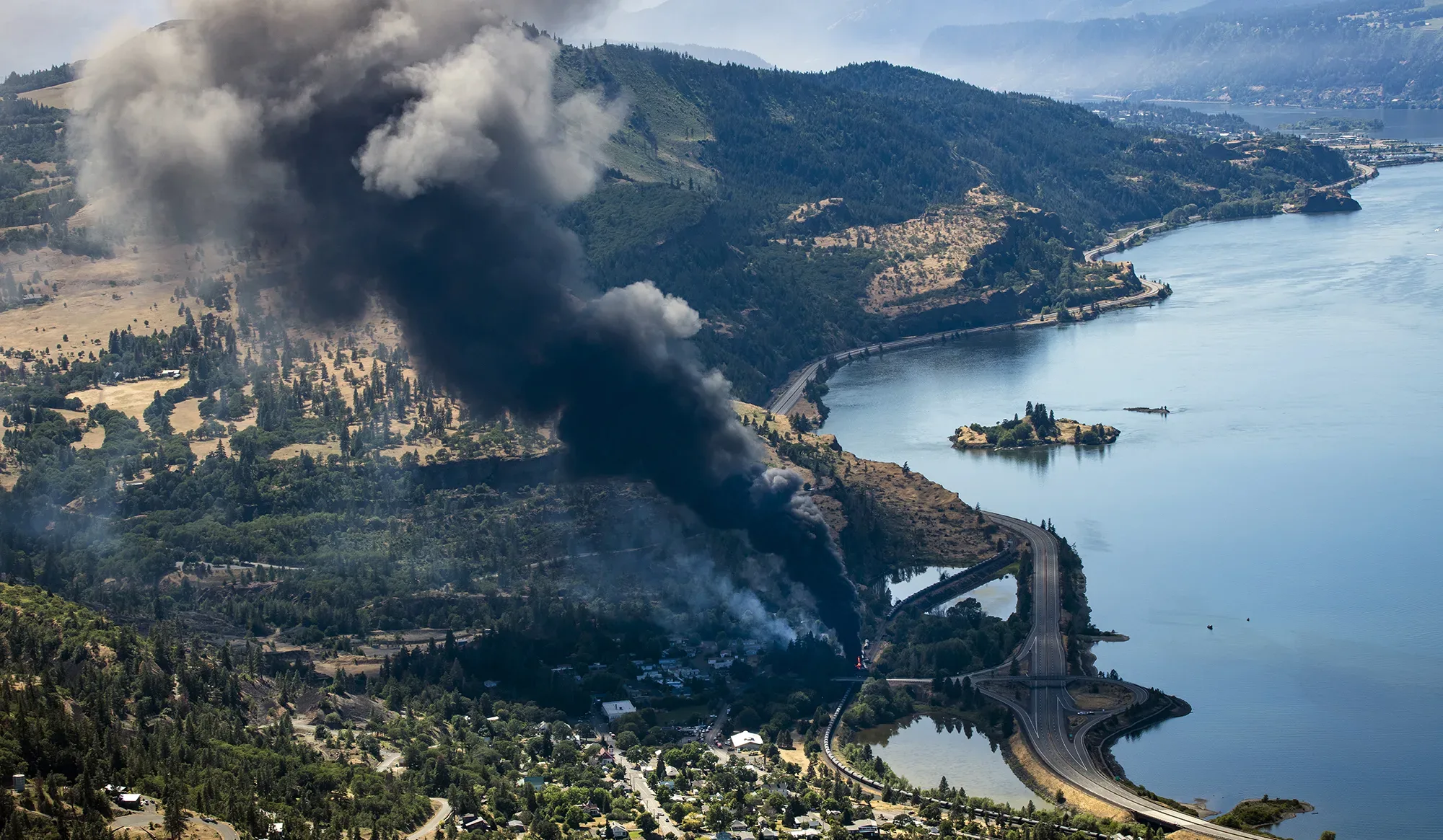 June 3, 2016: A Union Pacific unit oil train burns after derailing in Mosier, OR. Photo by Paloma Ayala.