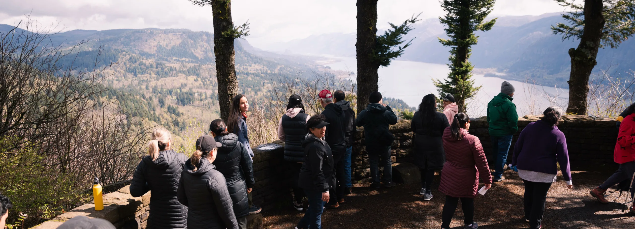 Gorge Accessibility Project Manager Mika Barrett (fourth from left, looking toward camera) leads Next Door, Inc., field trip and listening session at Cape Horn. (photographer: Nic Raingsey)