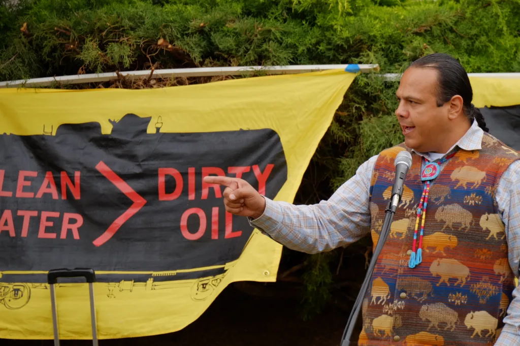 JoDe Goudy, then-Chair of the Confederated Tribes and Bands of the Yakama Nation, speaks at a rally in Mosier on the one-year anniversary of the June 2016 oil train derailment and fire. (photographer: Kyle Ramey for Stand Up to Oil)