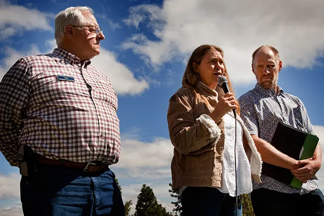 Mayors Stephen Lawrence (The Dalles), Arlene Burns (Mosier), and Paul Blackburn (Hood River) speak at a rally prior to a Wasco County Planning Commission hearing on rail expansion proposal. (photographer: Rick Rappaport)
