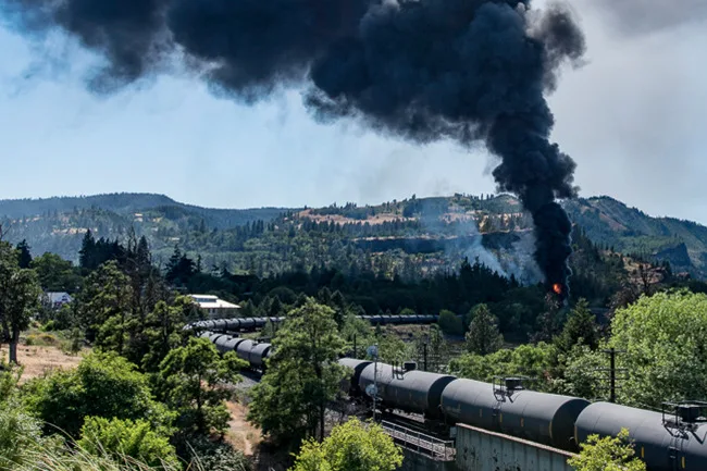 Oil train derailment and fire, seen from the east end of Mosier, June 3, 2016. (photographer: Michael McKaeg)